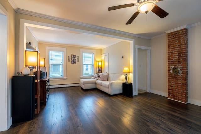 living room with a baseboard heating unit, dark wood-type flooring, ornamental molding, baseboards, and a ceiling fan