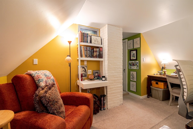 living area with vaulted ceiling and carpet flooring