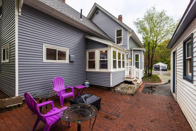 view of patio / terrace featuring a fire pit