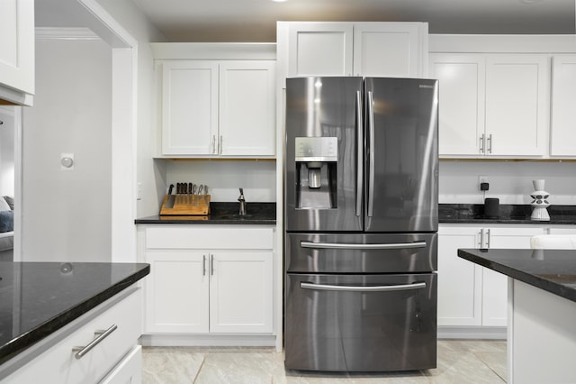15 Roosevelt Dr, Bedford, NH 03110 - kitchen featuring stainless steel fridge, white cabinetry, and dark stone counters