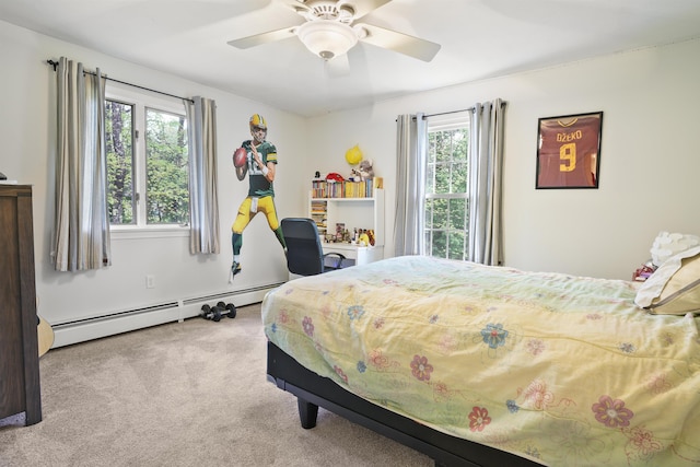 15 Roosevelt Dr, Bedford, NH 03110 - bedroom featuring baseboard heating, carpet floors, and a ceiling fan