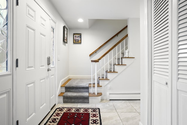 15 Roosevelt Dr, Bedford, NH 03110 - tiled entryway featuring baseboard heating, stairs, baseboards, and recessed lighting
