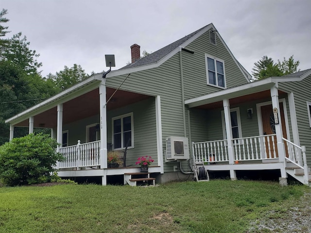 view of home's exterior with covered porch, a chimney, a lawn, and ac unit