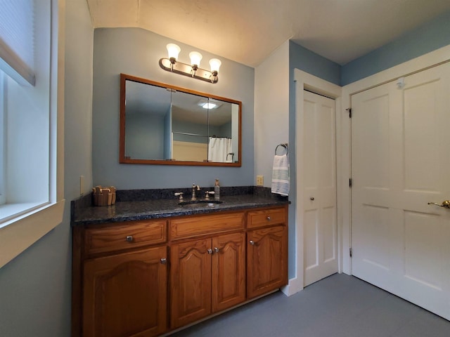full bathroom featuring vanity and tile patterned floors