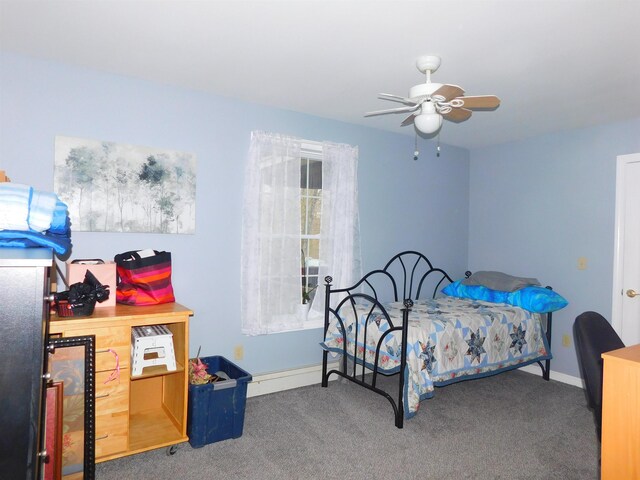 carpeted bedroom featuring baseboards and a ceiling fan