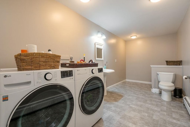 113 Watchtower Rd, Hopkinton, NH 03229 - washroom featuring washing machine and dryer, baseboards, and a baseboard heating unit