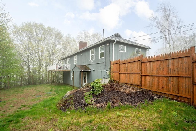 113 Watchtower Rd, Hopkinton, NH 03229 - back of house featuring a chimney and a deck