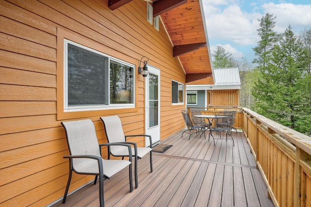 deck featuring outdoor dining space