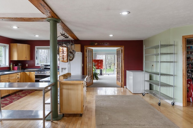 331 Gilman Rd, Sheldon, VT 05450 - kitchen featuring light wood-type flooring, plenty of natural light, fridge, a sink, and recessed lighting