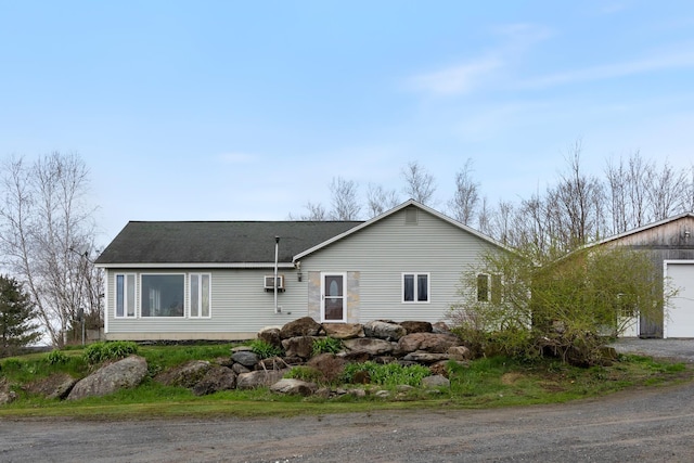 331 Gilman Rd, Sheldon, VT 05450 - single story home with a shingled roof and dirt driveway