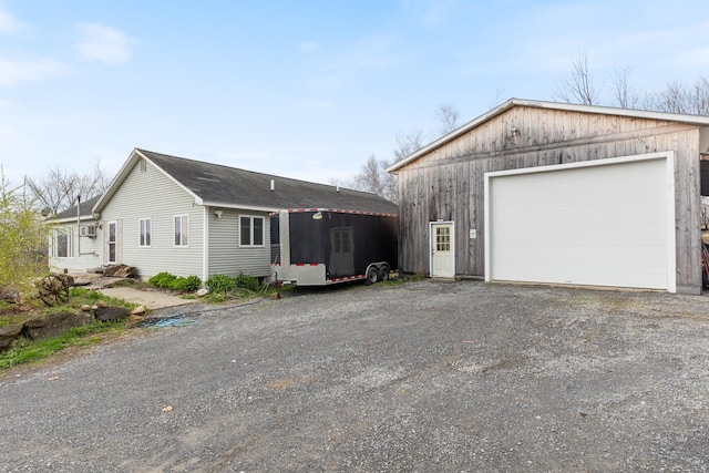 331 Gilman Rd, Sheldon, VT 05450 - view of front of home featuring a detached garage and driveway
