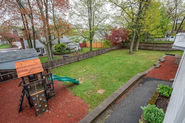 view of yard with a playground