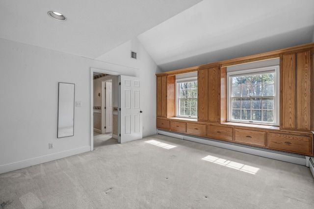 unfurnished room with light carpet, lofted ceiling, baseboards, a baseboard radiator, and recessed lighting