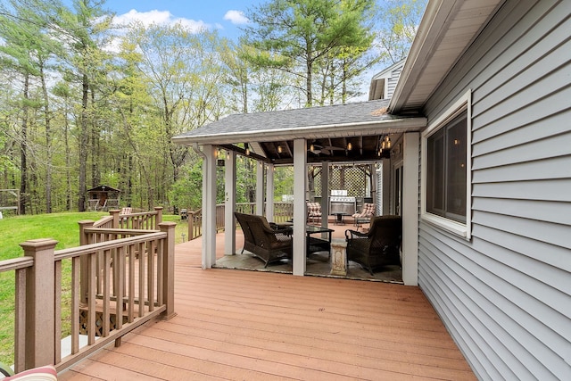 wooden terrace with ceiling fan