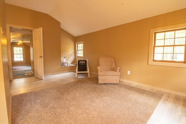 43 Parker Ledge Rd, Woodstock, NH 03262 - unfurnished room featuring lofted ceiling, plenty of natural light, wood finished floors, and baseboards