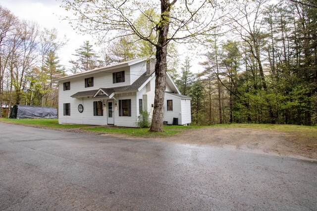 43 Parker Ledge Rd, Woodstock, NH 03262 - view of front of house featuring roof with shingles