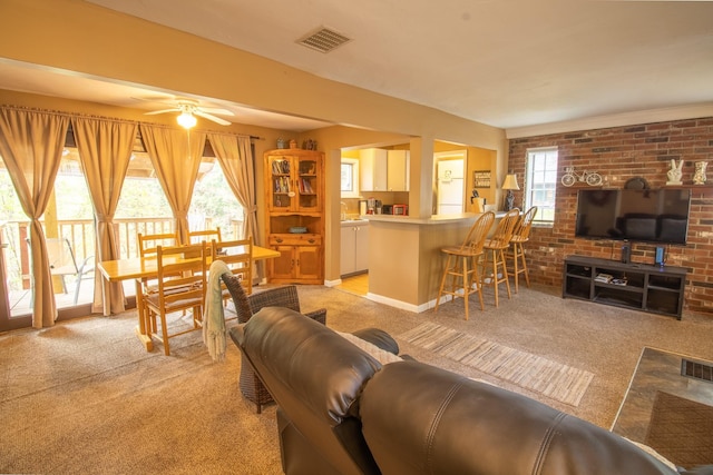43 Parker Ledge Rd, Woodstock, NH 03262 - living room with light colored carpet and a ceiling fan
