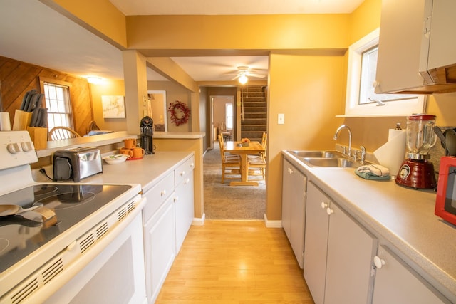 43 Parker Ledge Rd, Woodstock, NH 03262 - kitchen with electric stove, a sink, light countertops, and healthy amount of natural light