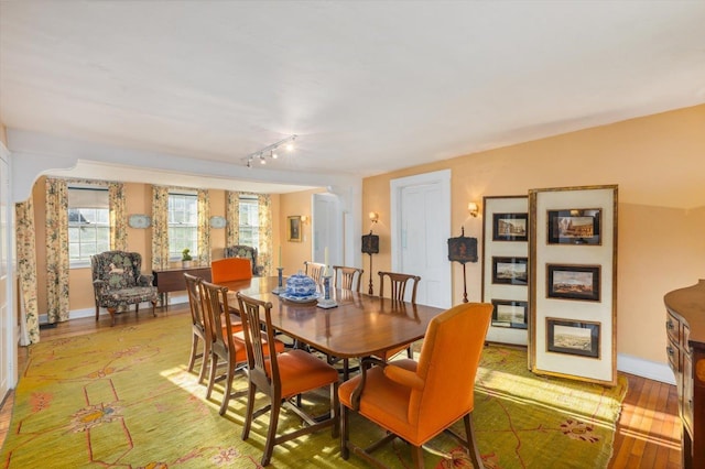 144 Parsons Rd, Dublin, NH 03444 - dining area featuring light wood-style floors, rail lighting, and baseboards