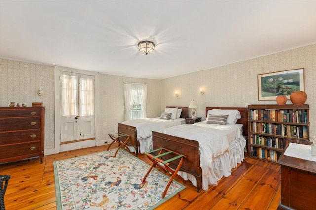 144 Parsons Rd, Dublin, NH 03444 - bedroom featuring wallpapered walls, hardwood / wood-style flooring, and crown molding
