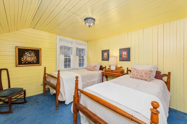 144 Parsons Rd, Dublin, NH 03444 - carpeted bedroom with wooden ceiling, wooden walls, and lofted ceiling
