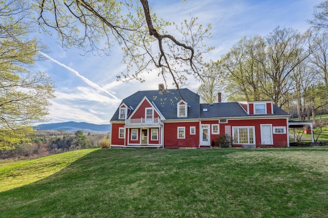 144 Parsons Rd, Dublin, NH 03444 - rear view of property with a balcony, a lawn, and a chimney