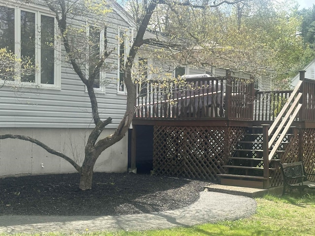wooden deck featuring stairway