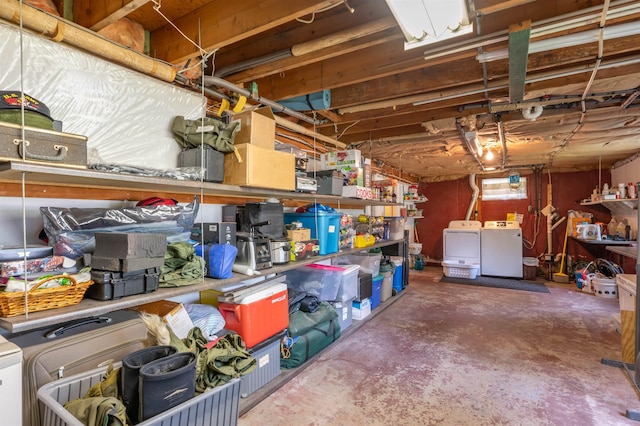 storage room with independent washer and dryer