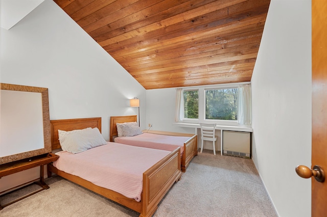 bedroom featuring wood ceiling, lofted ceiling, and light colored carpet