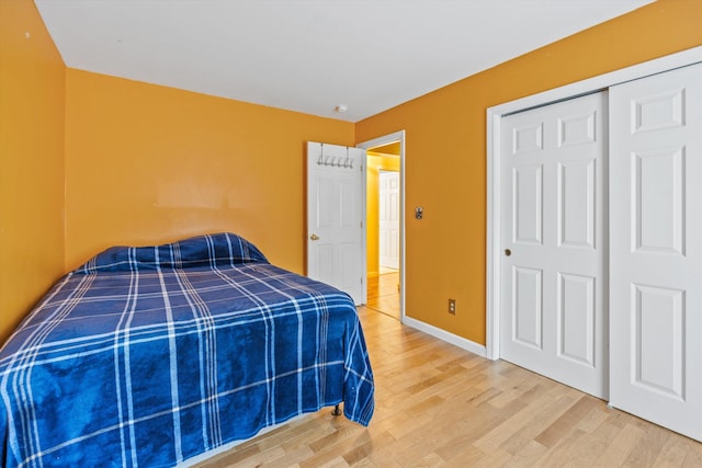 56 Call Rd, Webster, NH 03303 - bedroom featuring wood finished floors, baseboards, and a closet