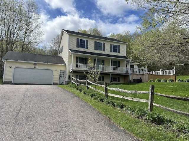 130 Rood Mill Rd, Fairfax, VT 05454 - view of front of house featuring asphalt driveway, a garage, and covered porch