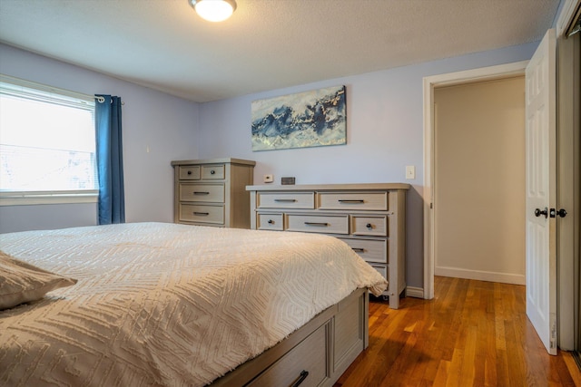 1 Alpine Rd, Windham, NH 03087 - bedroom featuring dark wood-style floors and baseboards