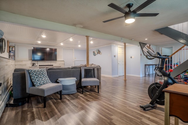 1 Alpine Rd, Windham, NH 03087 - living room with wood finished floors, ceiling fan, baseboards, and stairs