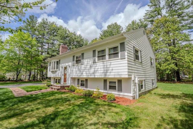 1 Alpine Rd, Windham, NH 03087 - raised ranch featuring a chimney and a front yard