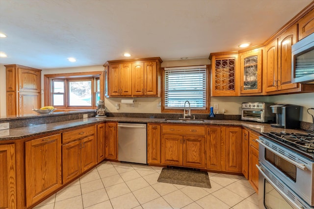 1 Alpine Rd, Windham, NH 03087 - kitchen with a sink, stainless steel appliances, brown cabinets, and recessed lighting