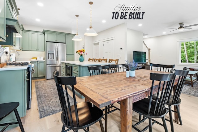 dining space featuring a ceiling fan, light wood finished floors, recessed lighting, and wine cooler