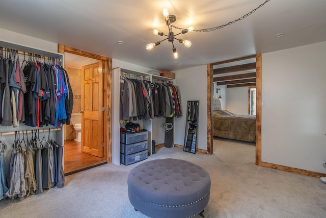 7206 S Wheelock Rd, Wheelock, VT 05851 - spacious closet featuring carpet floors and a chandelier