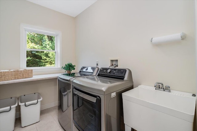 371 Tibbetts Hill Rd, Goffstown, NH 03045 - washroom with independent washer and dryer and light tile patterned floors