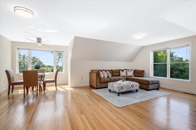 371 Tibbetts Hill Rd, Goffstown, NH 03045 - living area with plenty of natural light, light wood-type flooring, ceiling fan, and lofted ceiling