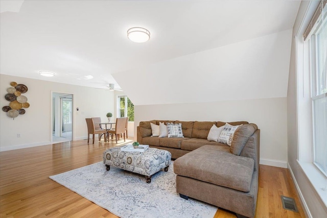 371 Tibbetts Hill Rd, Goffstown, NH 03045 - living room featuring wood finished floors, vaulted ceiling, and a ceiling fan