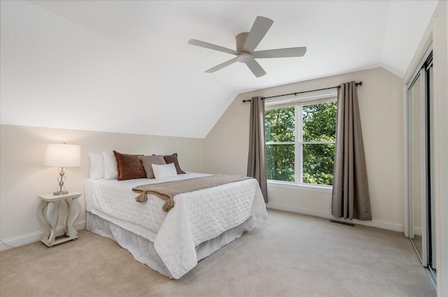 371 Tibbetts Hill Rd, Goffstown, NH 03045 - bedroom featuring vaulted ceiling, light carpet, a closet, and a ceiling fan