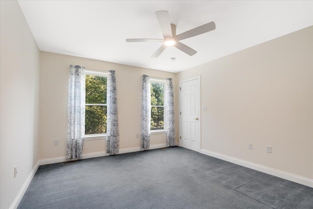 371 Tibbetts Hill Rd, Goffstown, NH 03045 - spare room with a ceiling fan and carpet