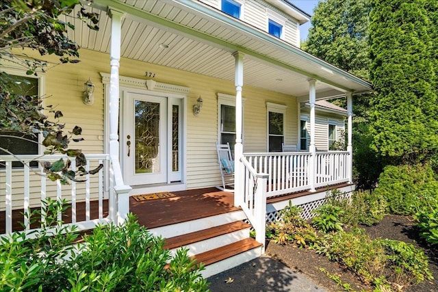 371 Tibbetts Hill Rd, Goffstown, NH 03045 - property entrance with a porch