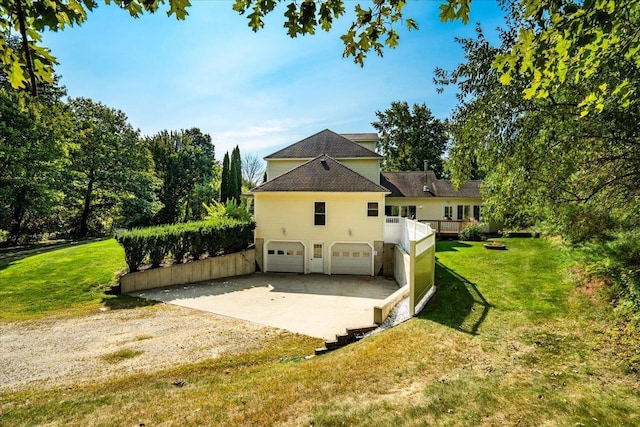 371 Tibbetts Hill Rd, Goffstown, NH 03045 - rear view of property featuring driveway, a garage, and a yard