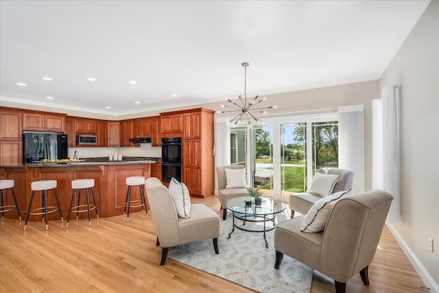 371 Tibbetts Hill Rd, Goffstown, NH 03045 - living room with light wood finished floors, a chandelier, recessed lighting, and ornamental molding
