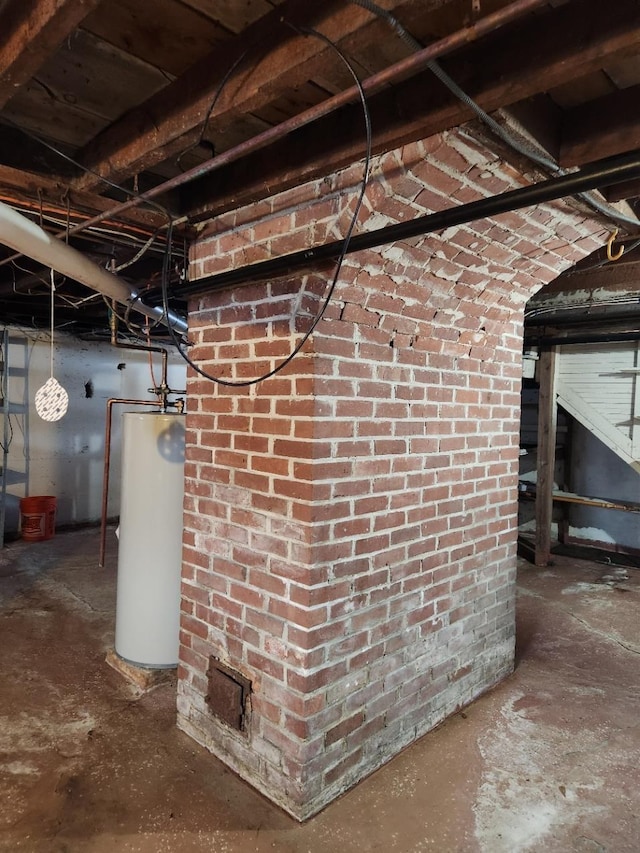 unfinished basement with water heater