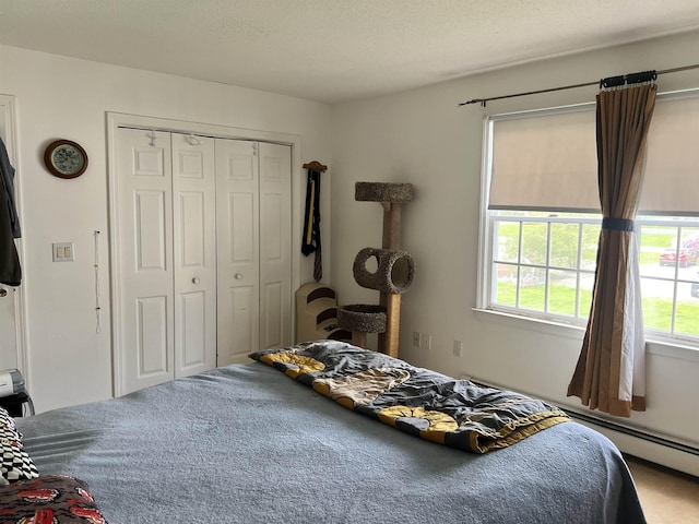 bedroom with carpet flooring and a closet