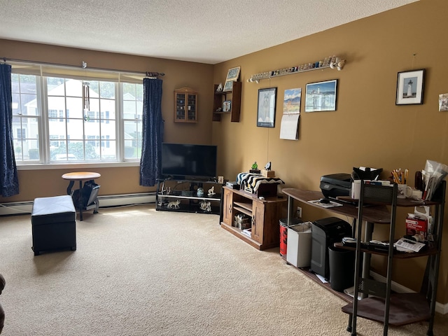 carpeted living area with a baseboard heating unit, a textured ceiling, and a desk