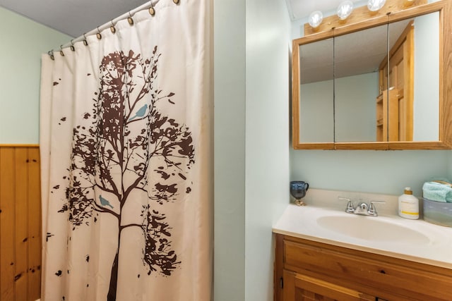 bathroom with vanity and a shower with curtain