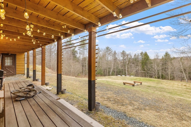 wooden terrace with a forest view